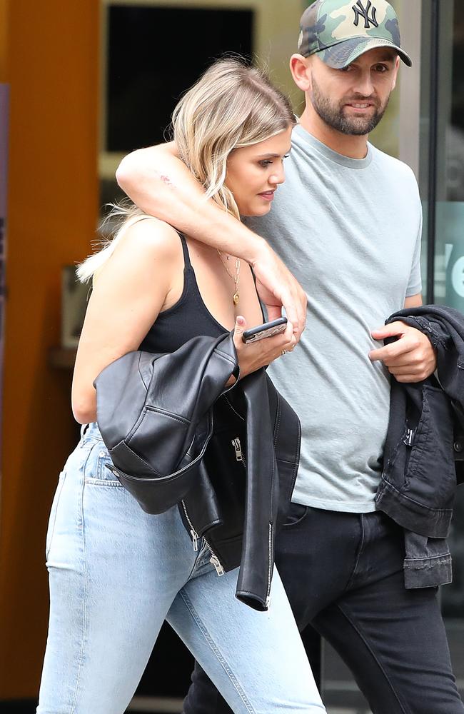 Off spinner Nathan Lyon and girlfriend Emma McCarthy looked cosy together a break before the Second Test at Lord's. Picture: Ella Pellegrini