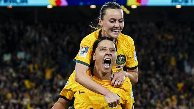 Matildas captain Sam Kerr, with teammate Hayley Raso, must also be front of mind as Australian of the Year after leading a women’s soccer team whose World Cup performances stole the hearts of millions. Picture: Getty Images