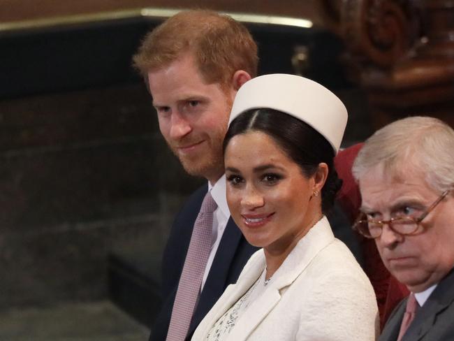 Prince Andrew does not appear to be as amused and Harry and Meghan during the Commonwealth Service at Westminster Abbey in March. Picture: Getty