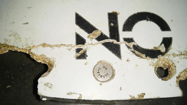 A suspected piece of aircraft debris found on the coast of Mozambique. Picture: AFP