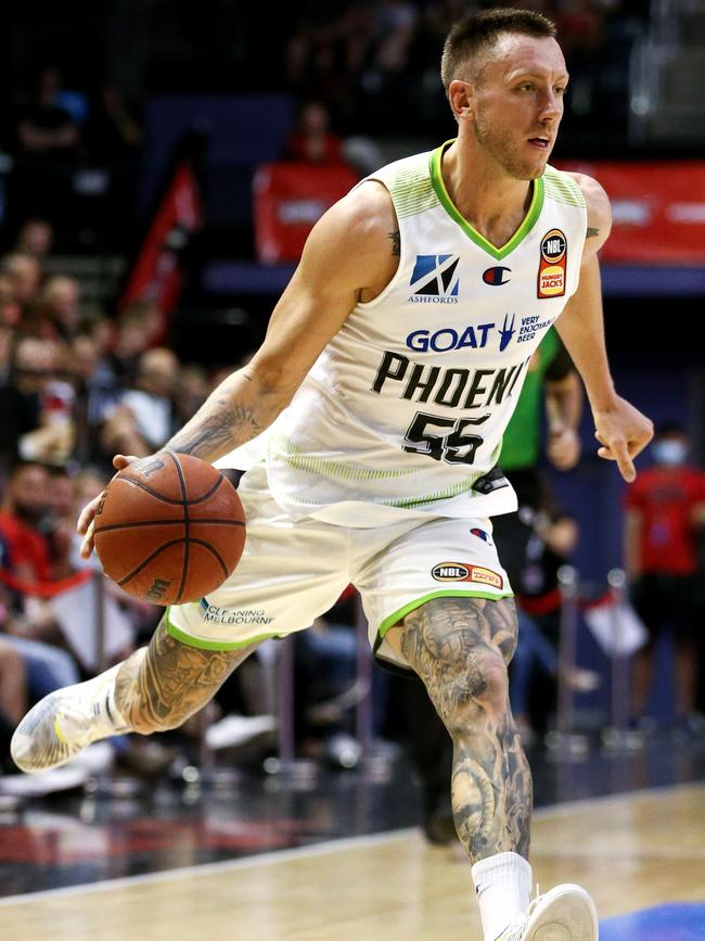 Creek of the Phoenix drives to the basket during NBL match.