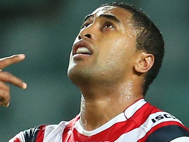 SYDNEY, AUSTRALIA - MAY 09: Michael Jennings of the Roosters celebrates scoring a try during the round nine NRL match between the Sydney Roosters and the Wests Tigers at Allianz Stadium on May 9, 2014 in Sydney, Australia. (Photo by Mark Kolbe/Getty Images)