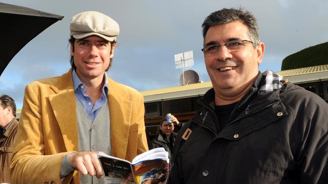 Racing fans and former AFL chiefs Gillon McLachlan, left, and Andrew Demetriou.