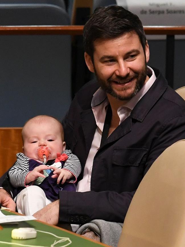 Baby Neve with her father Clarke Gayford at the UN meeting as her New Zealand PM mother Jacinda Ardern speaks during the Nelson Mandela Peace Summit September 24, 2018, one day before the start of the General Debate of the 73rd session of the General Assembly at the United Nations in New York. Picture: Don Emmert/AFP