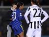 KINGSTON UPON THAMES, ENGLAND - DECEMBER 08: A pitch invader collides with Sam Kerr of Chelsea during the UEFA Women's Champions League group A match between Chelsea FC and Juventus at Kingsmeadow on December 08, 2021 in Kingston upon Thames, England. (Photo by Warren Little/Getty Images)