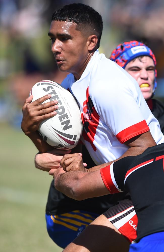 Boys Rugby League State Championship held at Northern Division, Brothers Leagues ground, Townsville. South West (black) v Wide Bay (white). 16-18 years. Blake Dynevor of Murgon SHS.