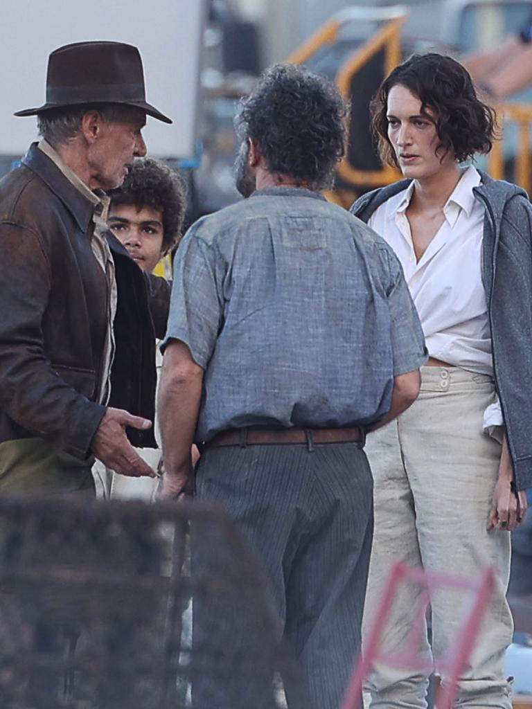 Harrison Ford and Phoebe Waller-Bridge on the set in Sicily last month. Picture: Robino Salvatore/GC Images