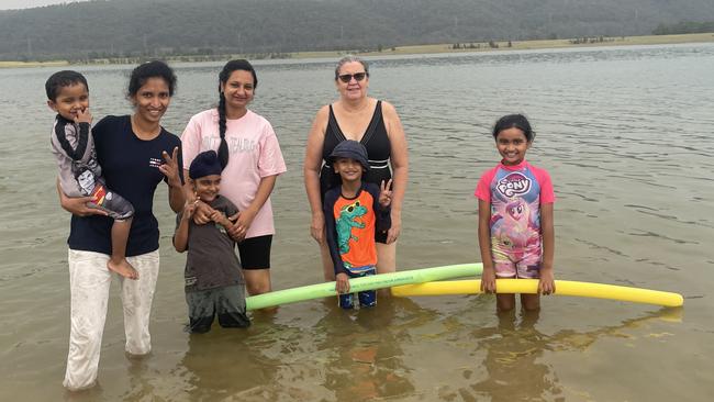 The Muhunthan family with Debby and Bhinder at Penrith Beach