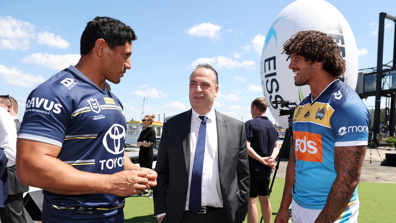 ARL chairman Peter V'landys talks to Jason Taumalolo of the Cowboys and Kevin Proctor of the Titans. Picture: Cameron Spencer/Getty Images