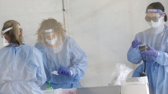 Staff at the 4Cyte Covid-19 drive-through testing clinic on River Street in Ballina on Friday. Picture: Liana Boss