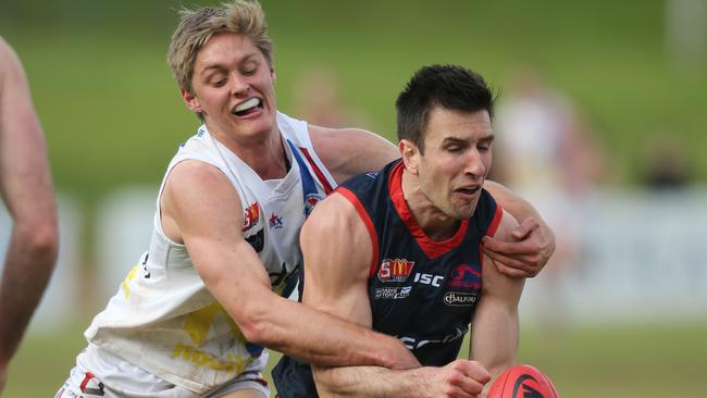 Norwood's Matthew Panos under pressure from Central's Jackson Hately. Picture: Dean Martin/AAP