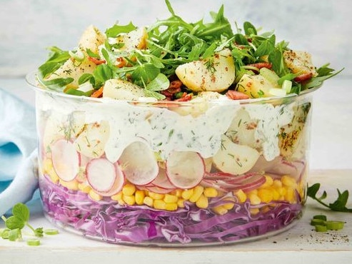 This layered crispy bacon and creamy potato salad is pure luxury