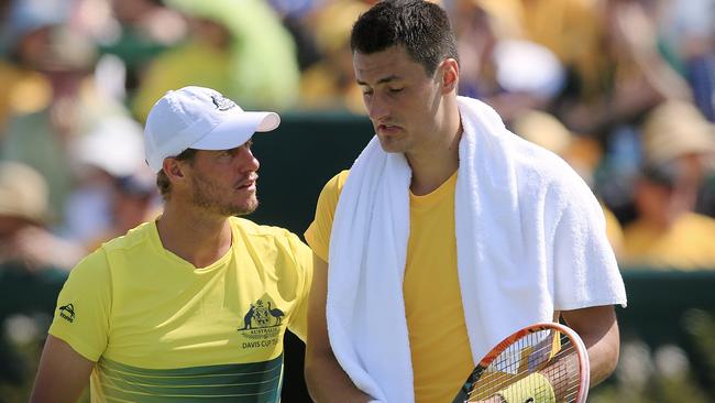 Bernard Tomic and Lleyton Hewitt side-by-side in the Davis Cup. Picture: Wayne Ludbey