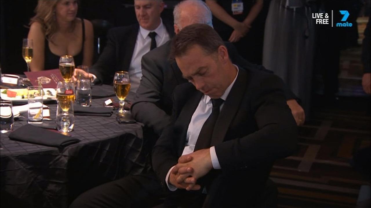 Alastair Clarkson was caught napping during Tom Mitchell's acceptance speech.