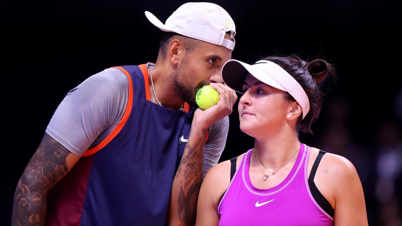 Nick Kyrgios talks tactics with Bianca Andreescu in Dubai. Picture: Francois Nel/Getty Images