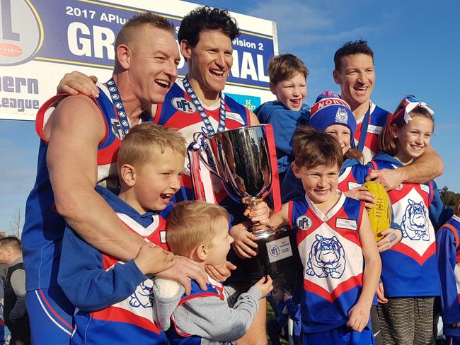 Shane Harvey celebrates the 2017 Division 2 premiership with cousin Blair and brother Brent. Picture: Tim Michell