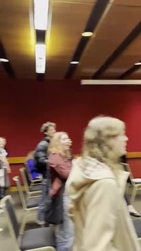 Members of transgender support group Community Action for Rainbow Rights disrupt a public hearing for Mark Latham's controversial Education Legislation Amendment (Parental Rights) Bill at NSW Parliament