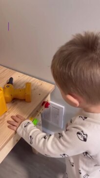 Tradie toddler follows in dad's footsteps