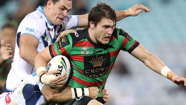 SYDNEY, AUSTRALIA — JUNE 16: Angus Crichton of the Rabbitohs is tackled during the round 15 NRL match between the South Sydney Rabbitohs and the Gold Coast Titans at ANZ Stadium on June 16, 2017 in Sydney, Australia. (Photo by Mark Kolbe/Getty Images)