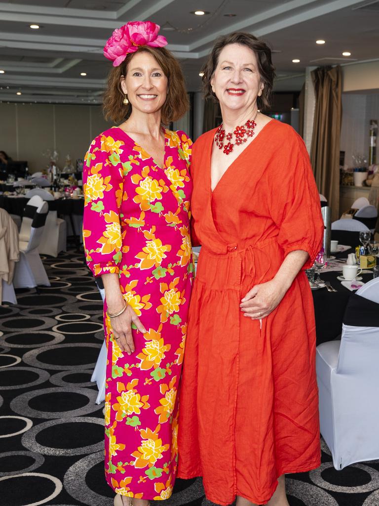 Paula Tregaskis (left) and Jill Scanlan at the Melbourne Cup luncheon hosted by Rotary Club of Toowoomba City raising funds for Protea Place, Tuesday, November 1, 2022. Picture: Kevin Farmer