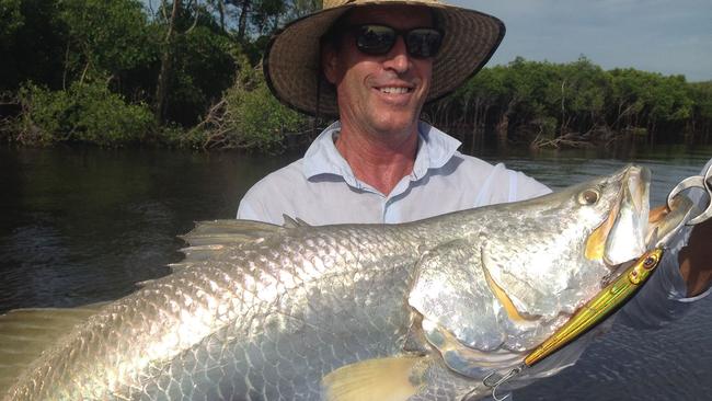 A happy Obsession Safaris client with a solid barra taken on the new Gold Longshot Bomber.