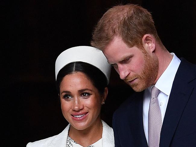 (FILES) In this file photo taken on March 11, 2019 Britain's Prince Harry, Duke of Sussex (R) and Meghan, Duchess of Sussex leave after attending a Commonwealth Day Service at Westminster Abbey in central London. - Prince Harry will produce a documentary about the Invictus Games for disabled military veterans -- the first series under a lucrative deal he and  wife Meghan Markle signed with Netflix after moving to California last year.  Harry, who served with the British military in Afghanistan, will appear on camera and executive-produce "Heart of Invictus," a multi-episode series which follows competitors as they train for next spring's competition in The Hague. (Photo by Ben STANSALL / AFP)