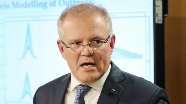 Scott Morrison addressing the media about new restrictions and advice for Australians on how to deal with the spread of COVID-19. Picture: Richard Dobson