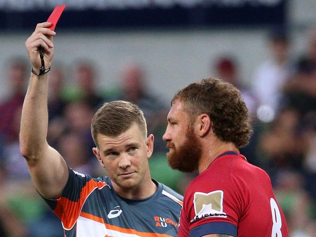 The Reds’ Scott Higginbotham is sent off against the Rebels last season. Picture: AAP 