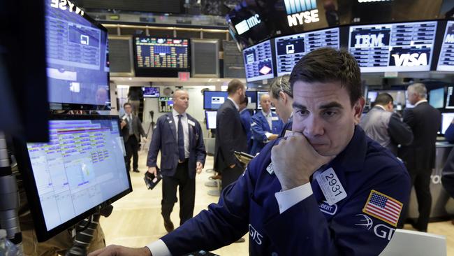 Wall St slipped as earnings reports were mixed. Picture: AP Photo/Richard Drew.