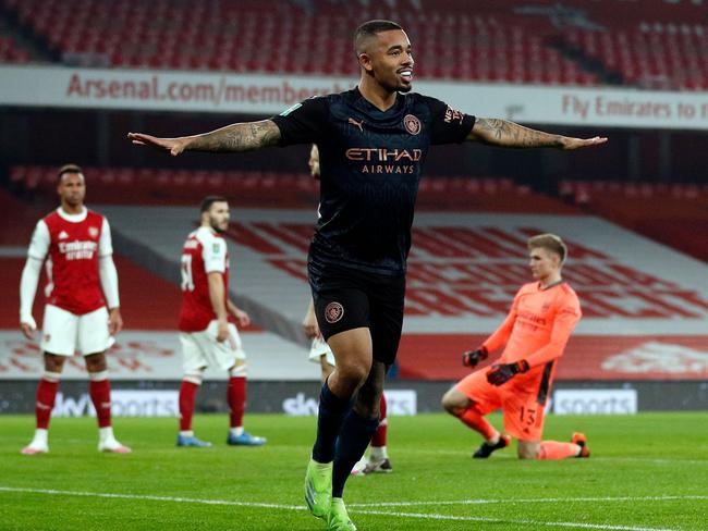 TOPSHOT - Manchester City's Brazilian striker Gabriel Jesus celebrates scoring during the English League Cup quarter final football match between Arsenal and Manchester City at the Emirates Stadium, in London on December 22, 2020. (Photo by Adrian DENNIS / AFP) / RESTRICTED TO EDITORIAL USE. No use with unauthorized audio, video, data, fixture lists, club/league logos or 'live' services. Online in-match use limited to 120 images. An additional 40 images may be used in extra time. No video emulation. Social media in-match use limited to 120 images. An additional 40 images may be used in extra time. No use in betting publications, games or single club/league/player publications. /