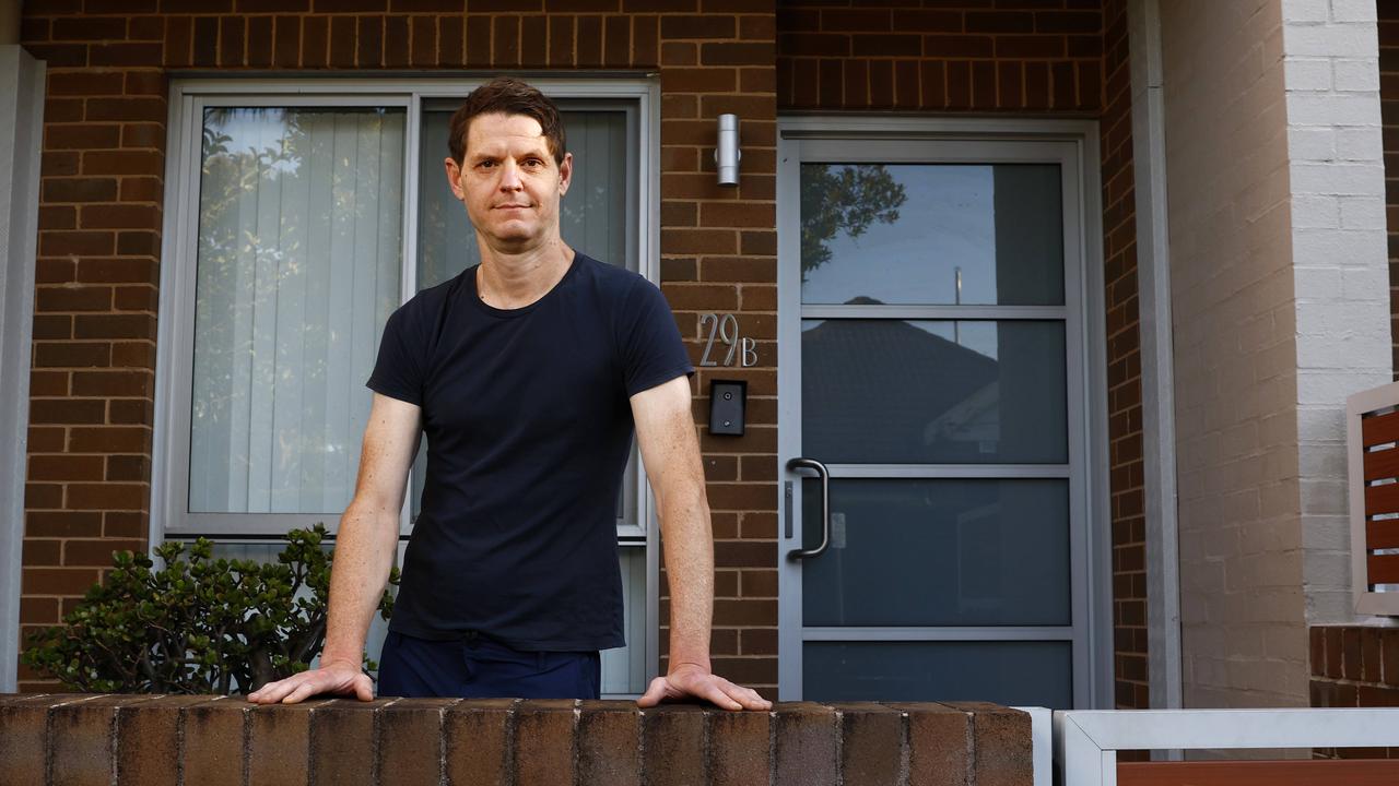 Jim Flanagan outside the rental property in May. Picture: Jonathan Ng