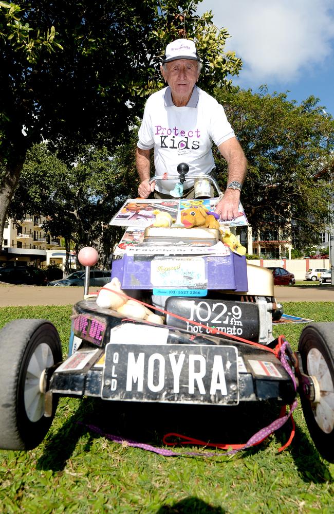 Mr Harvey with the mower he pushes across Australia.