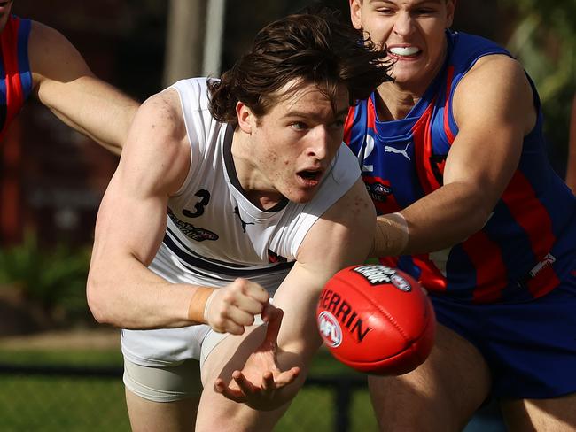 NAB League. Oakleigh Charges vs Northern Knights at Warrawee Park, Oakleigh. 19/06/2021.   Josh Ward clears by hand   .  Pic: Michael Klein