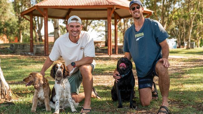 Port Adelaide players Ollie Wines, with Billie and Bowie and Scott Lycett with Kevin. Picture: PAFC