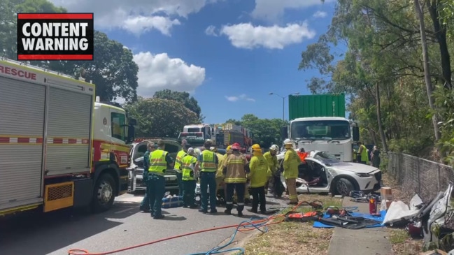 Person cut free from horror crash in Brisbane's north