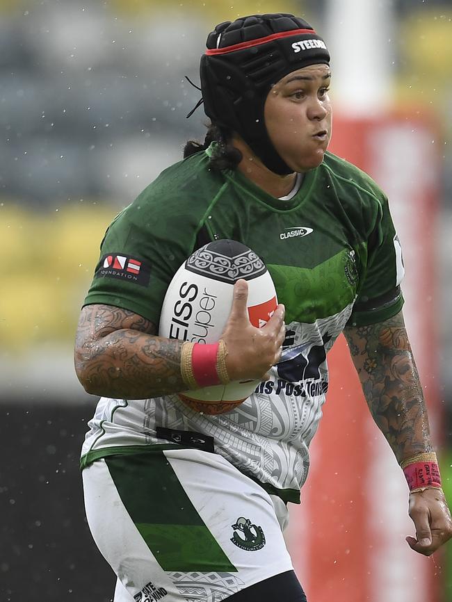 Rona Peters of the Maori All Stars runs the ball during the NRL All Stars game between Indigenous and Maori Women's at Queensland Country Bank Stadium on February 20, 2021 in Townsville, Australia. (Photo by Ian Hitchcock/Getty Images)