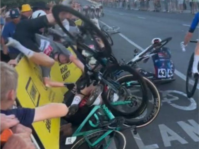 A devastating crash has marred Saturday’s Tour Down Under, leaving a fan hospitalized with serious injuries.