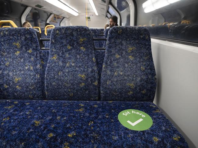 Social distancing signs are seen on a train at Bondi Junction Station in Sydney. Picture: Getty