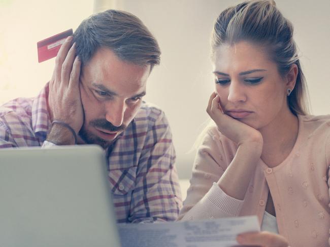 A couple having problem with bills and money. Generic relationships, laptop, expenses. Picture: iStock.