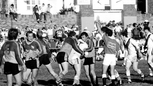 A Great Britain forward runs into the defence of Toowoomba Clydesdales prop forward Rohan Hancock (left) and second-rower Peter Connell, with Greg Platz on left (No. 9) running back into position in 1979. The mighty galloping Clydesdales won the match 19-16. Photo: By Lionel Coxen compliments of Allora Regional Sports Museum. Photo Contributed