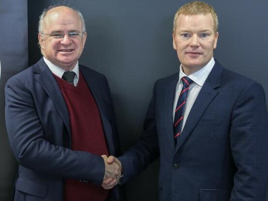 Golden handshake: Cr Wilson with Mark Stapleton shortly after the latter was appointed to council’s top job last year.