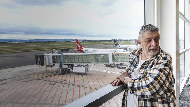 Chris Harwood waiting for brother Stephen to arrive at Adelaide airport. Picture: Roy VanDerVegt