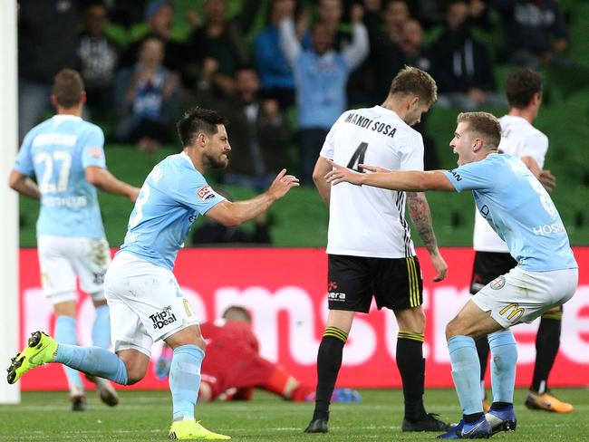 Bruno Fornaroli of Melbourne City (left) celebrates a goal with team mate Riley McGree during the Round 4 A-League match between Melbourne City and the Wellington Phoenix at AAMI Park in Melbourne, Friday, November 9, 2018. (AAP Image/Hamish Blair) NO ARCHIVING, EDITORIAL USE ONLY