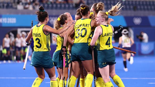 The Hockeyroos celebrate a goal in Tokyo.