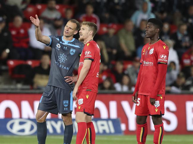 SOCCER - A-LEAGUE - Adelaide United v Sydney at Coopers Stadium. VAR - Alexander Wilkinson and Ben Halloran and Al Hassan Toure watch -  Toure goal - which was later confirmed Picture SARAH REED