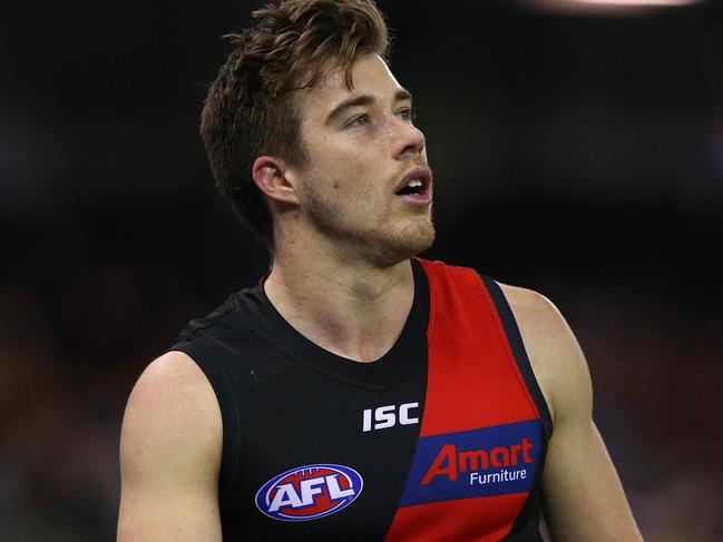 MELBOURNE, AUSTRALIA - AUGUST 10: Zach Merrett of the Bombers looks on during the round 21 AFL match between the Essendon Bombers and the Western Bulldogs at Marvel Stadium on August 10, 2019 in Melbourne, Australia. (Photo by Graham Denholm/Getty Images)