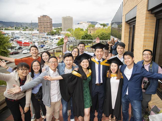 Wei Ming Wong, Goh Jian Hao and Sabrina Ong with friends. UTAS graduations. School of College of Health and Medicine Graduate Research. Picture: RICHARD JUPE