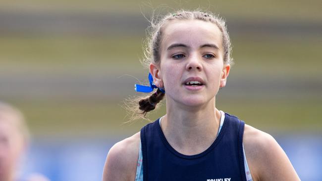 23/09/23. News Local, Sport,Homebush, NSW, Australia.Pictures from the NSW Athletics All Schools Championships at Sydney Athletic Centre in Homebush.Girls 1500 Meter Run Primary 10 YearsEmma Shiels from Toukley Public School ToukleyPicture: Julian Andrews