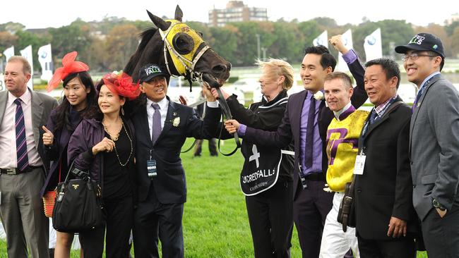 Jockey Zac Purton and winning owners during day one of the 2014 The Championships at Royal Randwick Racecourse.