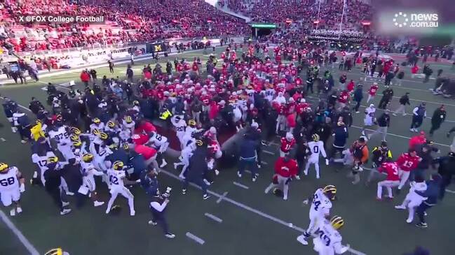 Pepper spray used as college football brawl erupts